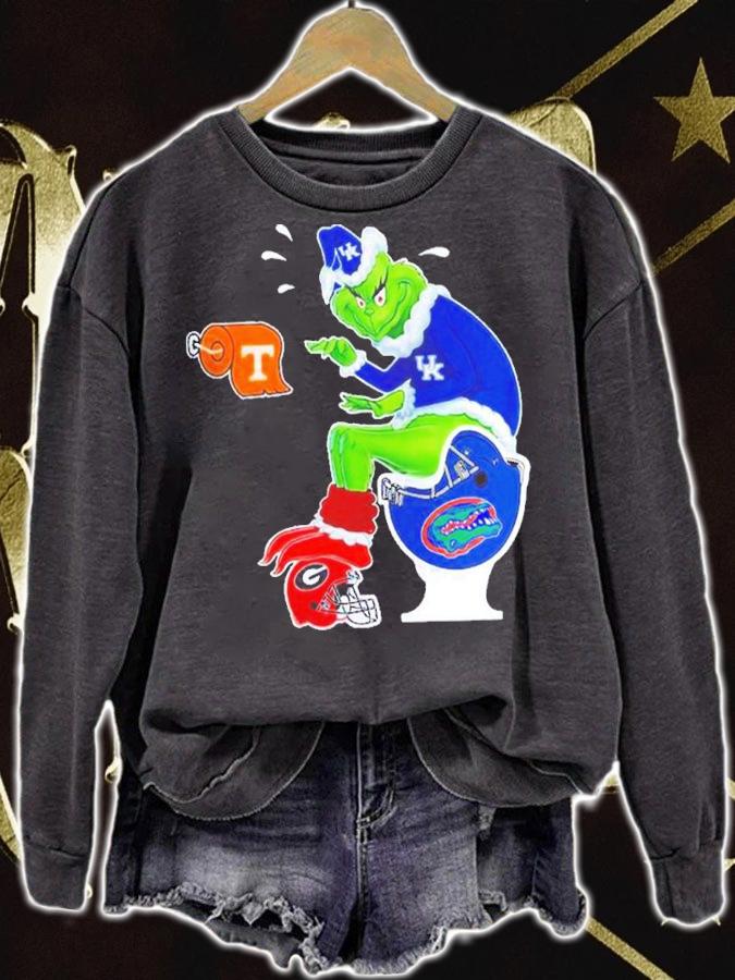 The Grinch Kentucky Wildcats Sitting On Florida Gators And Other Teams Christmas Shirt t-shirt sweatshirt