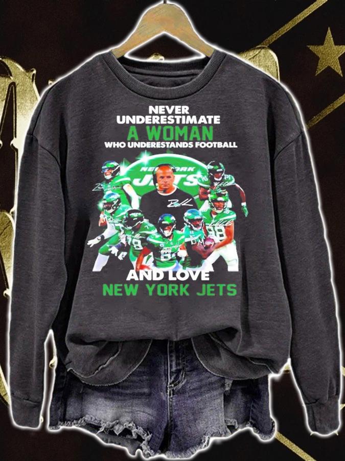 Never underestimate a woman New York Jets signature shirt t-shirt sweatshirt