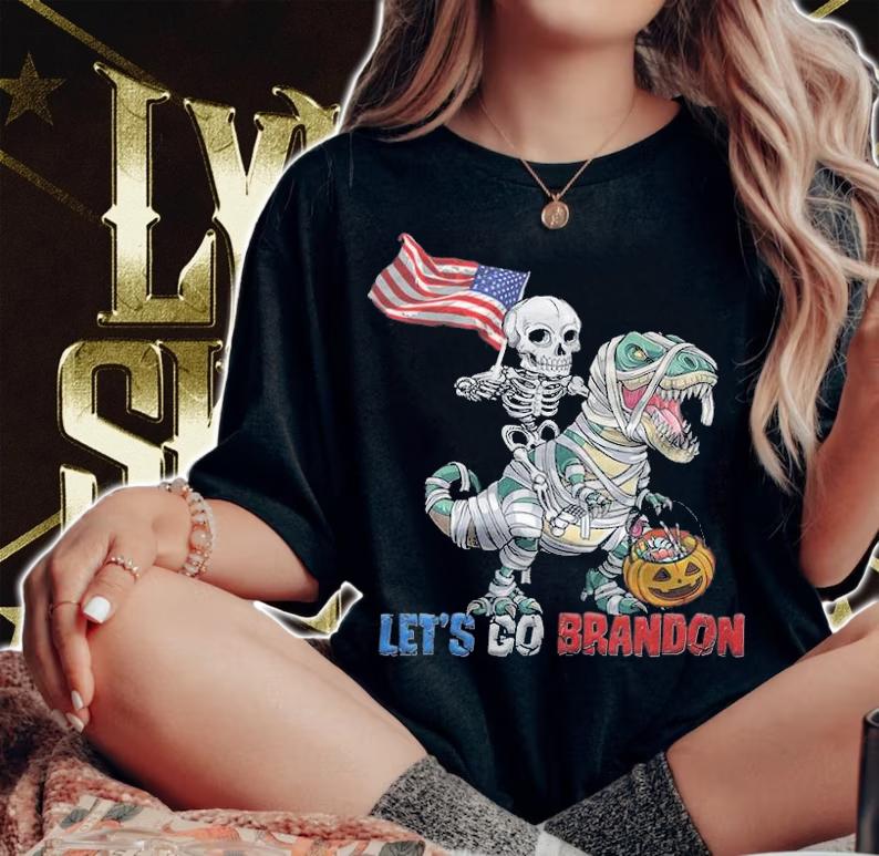 F Joe Biden skeleton Ridding Dinosaur T Rex Let's Go Brandon Halloween T-Shirt t-shirt